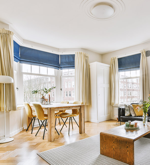 A light, modern living room in a victorian conversion