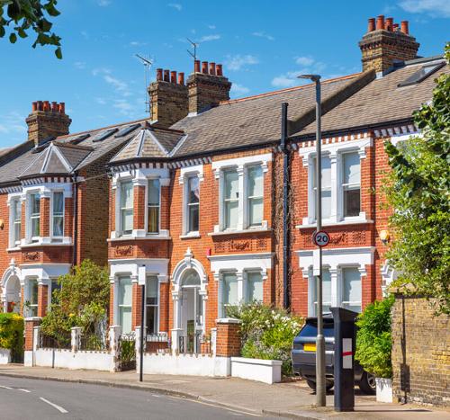 Victorian terraced houses in West London on a sunny day.